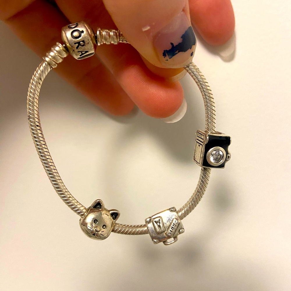 Pandora bracelet with three charms
